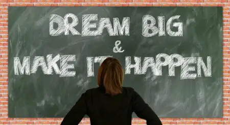 A chalk board saying: dream-big & make it happen